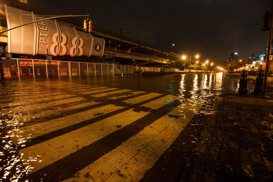 This photo provided by Dylan Patrick shows flooding along the Westside Highway as Sandy moves through the area Monday, Oct. 29, 2012 in New York. Much of New York was plunged into darkness Monday by a superstorm that overflowed the city's historic waterfront, flooded the financial district and subway tunnels and cut power to nearly a million people. (AP Photo/Dylan Patrick) MANDATORY CREDIT: DYLAN PATRICK