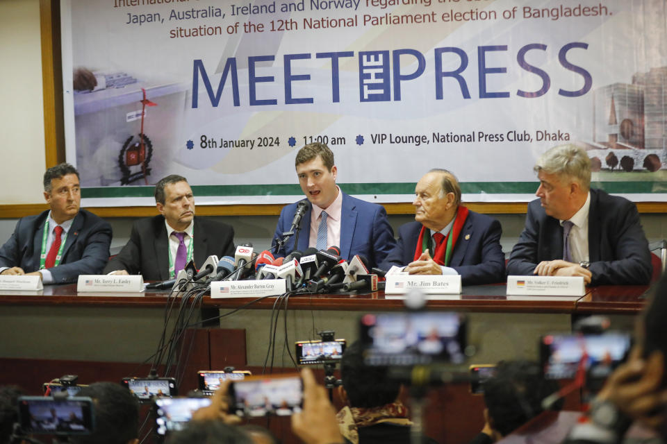 International election observers address a press conference at the National Press Club in Dhaka, Bangladesh, Monday, Jan.8, 2024. Prime Minister Sheikh Hasina has won an overwhelming majority in Bangladesh's parliamentary election after a campaign fraught with violence and a boycott from the main opposition party, giving her and her Awami League a fourth consecutive term. (AP Photo/Mahmud Hossain Opu)