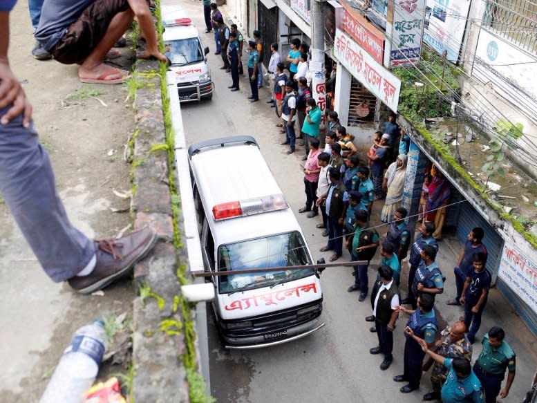 Ambulances leave after a police operation on militants on the outskirts of Dhaka, Bangladesh, July 26, 2016. REUTERS/Mohammad Ponir Hossain