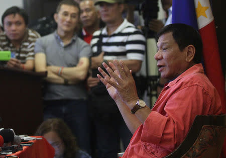 Philippine President-elect Rodrigo Duterte gestures during a news conference to apologise to Canadian Prime Minister Justin Trudeau, at a hotel in Davao city, southern Philippines May 26, 2016. REUTERS/Stringer