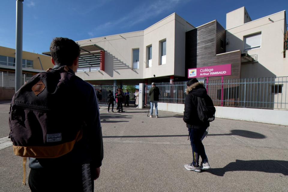 Students arrive on April 4, 2024 in Montpellier, southern France, at the College Arthur-Rimbaud secondary school a day after a 14-year-old girl was assaulted outside the school (AFP via Getty Images)