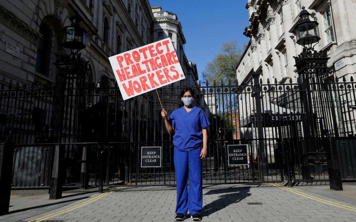 Doctor Meenal Viz protesting about the lack of PPE and protection for NHS health workers in April 2020 - Kirsty Wigglesworth /AP