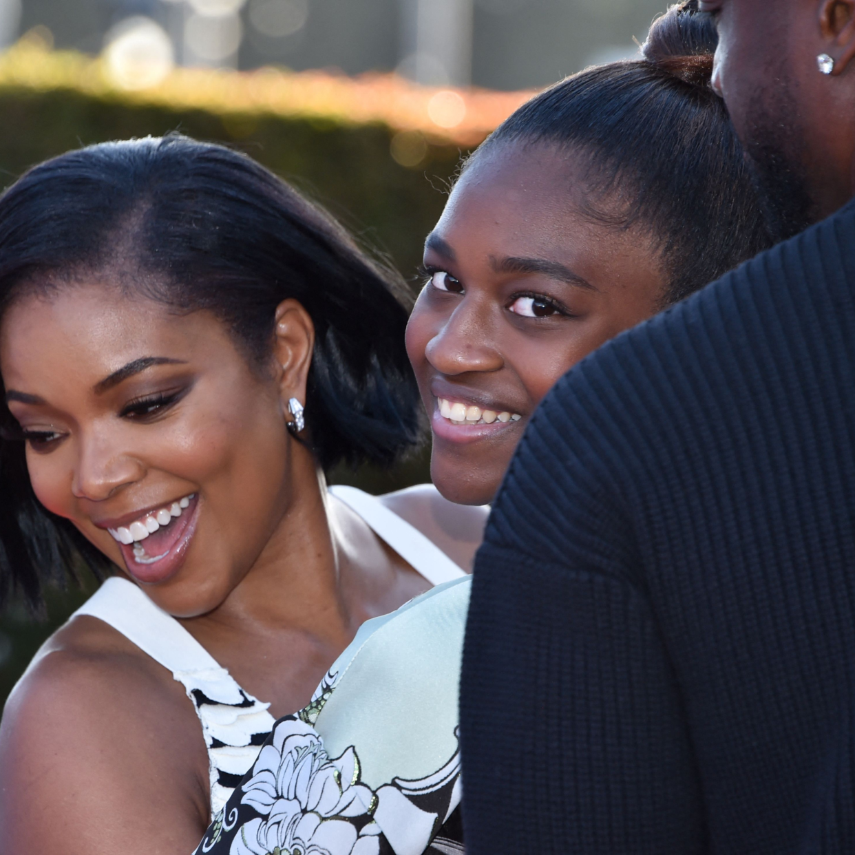  US actress Gabrielle Union and her daughter Zaya Wade arrive for the "Cheaper by the Dozen" Disney premiere at the El Capitan theatre in Hollywood, California, March 16, 2022. 