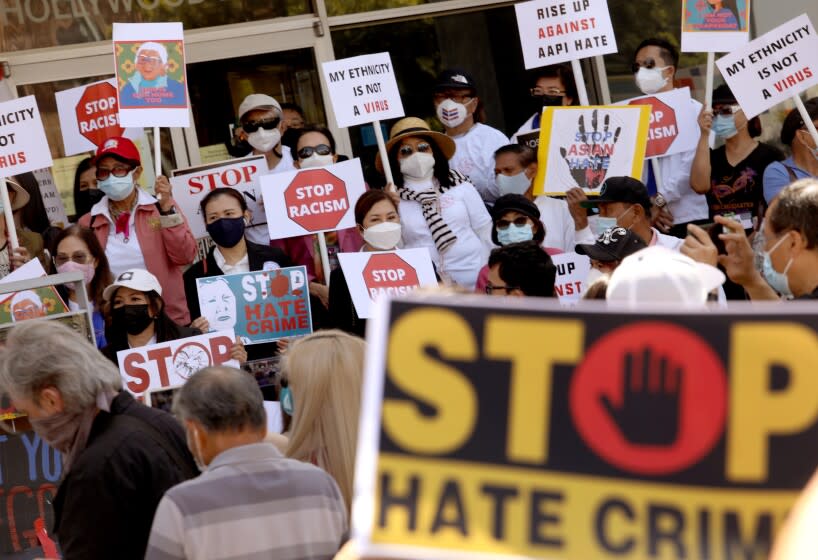 LOS ANGELES, CA - APRIL 8, 2021 - - Members of the Thai-American community along with political leaders and members of law enforcement participate in a rally against Asian hate crimes in Thai Town in Los Angeles on April 8, 2021. They also gathered to show solidarity for the AAPI community. Los Angeles City Councilman Mitch O'Farrell and Los Angeles City Attorney Mike Feuer spoke against anti-Asian sentiment at the rally. (Genaro Molina / Los Angeles Times)