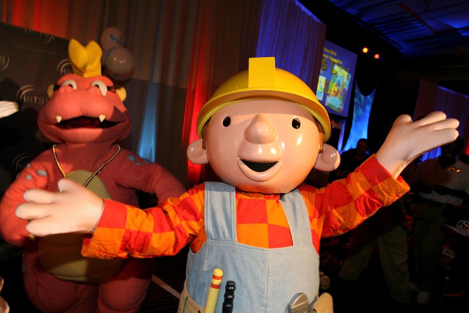 Barney and Bob the Builder poses as they arrive at the Hollywood Radio & Television Society “Kids Day 2006” at the Hollywood and Highland complex on August 2, 2006 in Hollywood, California.