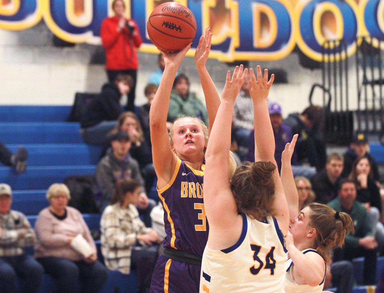 Bronson's Payton Springstead rises up for a shot attempt against Centreville in prep hoops action on Friday night.