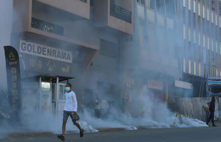 Riot police fire tear gas canisters to disperse opposition demonstrators protesting against new electoral laws in Antananarivo, Madagascar April 21, 2018. REUTERS/Clarel Faniry Rasoanaivo