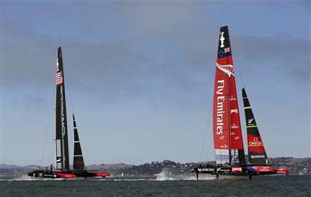 Emirates Team New Zealand (R) gets out to an early lead against Oracle Team USA during Race 7 of the 34th America's Cup yacht sailing race in San Francisco, California September 12, 2013. REUTERS/Robert Galbraith