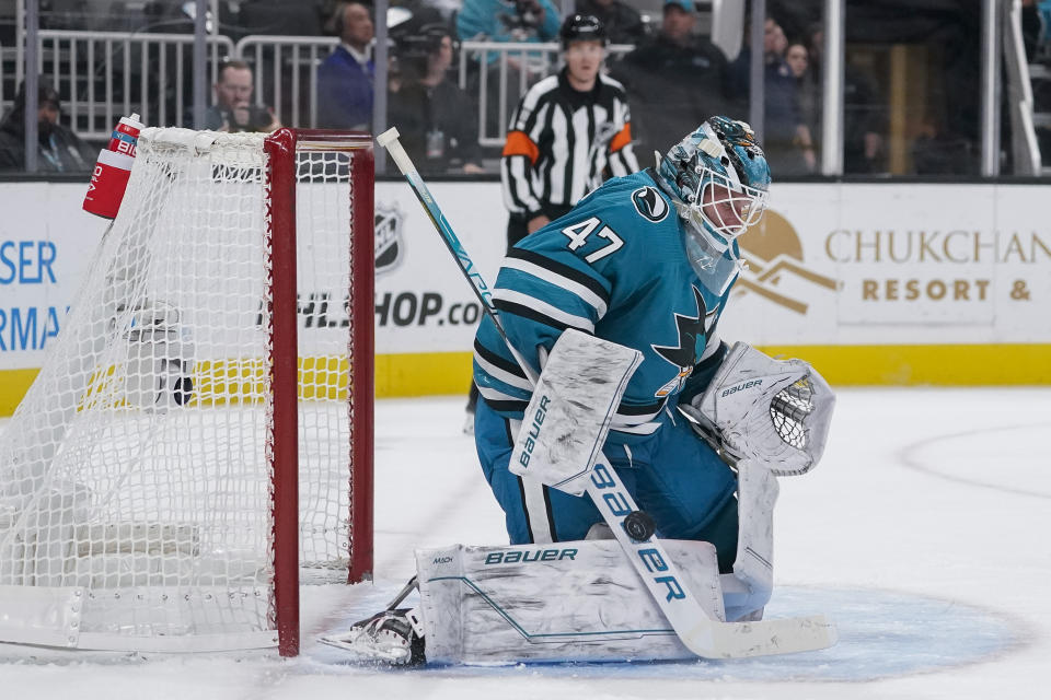 San Jose Sharks goaltender James Reimer deflects a Florida Panthers shot during the second period of an NHL hockey game in San Jose, Calif., Thursday, Nov. 3, 2022. (AP Photo/Godofredo A. Vásquez)