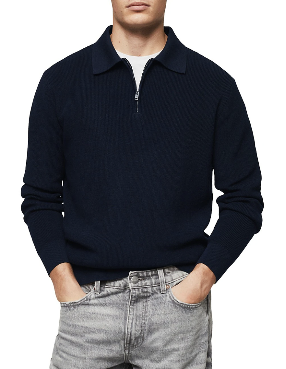 male model wearing grey jeans and dark navy blue black Mango Roma Structured-Knit Zip-Neck Polo Shirt (photo via The Bay)