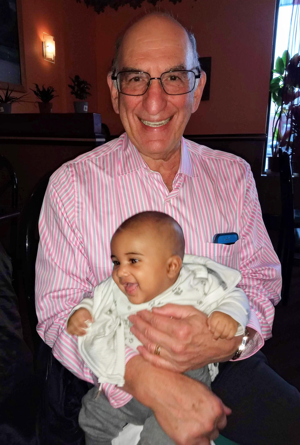 Avishai with his grandfather, the author's father. (Courtesy Jay Deitcher)