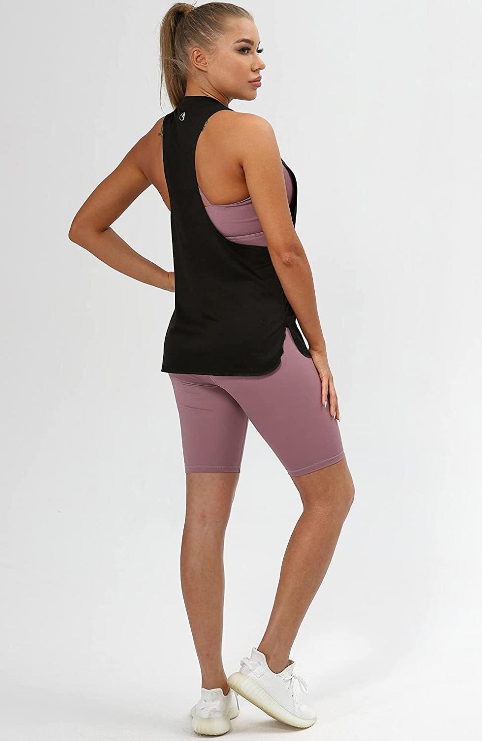 You can show off that cute sports bra you love when you wear this top.<br /><br /><strong>Promising review:</strong> "I teach fitness classes multiple times per week. This is my go-to top! I have it in six colors. I love the cut on the arm opening up to the neck. It really flatters the shoulder muscles. Also, the arm opening is low enough to show off a cute sports bra while also being loose enough to maintain appropriateness while 'working.' They wash and dry really well too. It fits true to size." &mdash; <a href="https://www.amazon.com/gp/customer-reviews/R2B1RKOXY2F4TE?&amp;linkCode=ll2&amp;tag=huffpost-bfsyndication-20&amp;linkId=949708fca83ce6b5aecb2c84f02f7b3f&amp;language=en_US&amp;ref_=as_li_ss_tl" target="_blank" rel="nofollow noopener noreferrer" data-skimlinks-tracking="4978705" data-vars-affiliate="Amazon" data-vars-href="https://www.amazon.com/gp/customer-reviews/R2B1RKOXY2F4TE?tag=bfabby-20&amp;ascsubtag=4978705%2C13%2C21%2Cmobile_web%2C0%2C0%2C0" data-vars-keywords="fast fashion" data-vars-link-id="0" data-vars-price="">Ticket81</a><br /><br /><a href="https://www.amazon.com/icyzone-Workout-Tank-Tops-Women/dp/B0753GBMVM?&amp;linkCode=ll1&amp;tag=huffpost-bfsyndication-20&amp;linkId=3d17d693646cf4d02595a49eabc40928&amp;language=en_US&amp;ref_=as_li_ss_tl" target="_blank" rel="noopener noreferrer"><strong>Price: $23.79+ (available in XS-XL and in 10 colors and varieties)</strong></a>