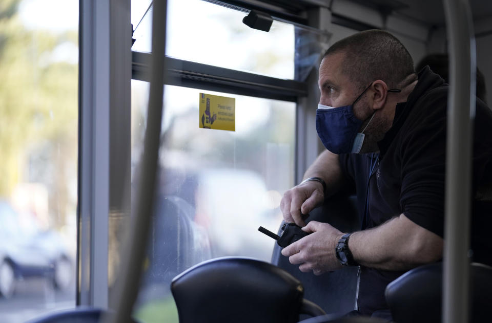 EMBARGOED UNTIL 1500 THURSDAY FEBRUARY 17 An officer from Dorset Police sits inside a double decker bus as he observes driver behaviour, including motorists using their mobile phones whilst driving, during the force's 'Op Decker' mobile phone at the wheel enforcement operation, in Bournemouth, Dorset. Picture date: Thursday February 17, 2022.