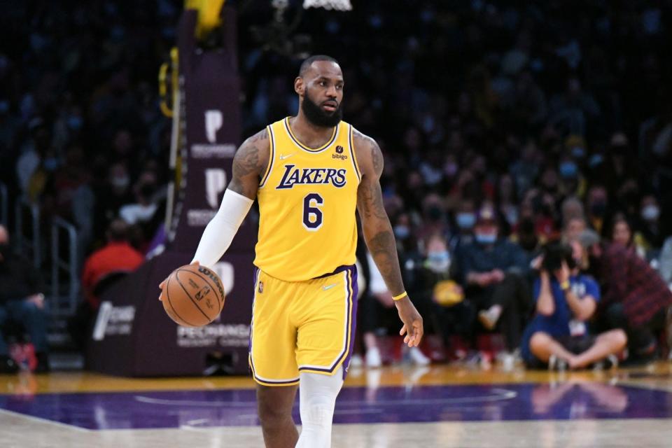 Los Angeles' LeBron James dribbles up the court as the Lakers host the Pacers at Crypto.com Arena in Los Angeles on Jan. 19, 2022.