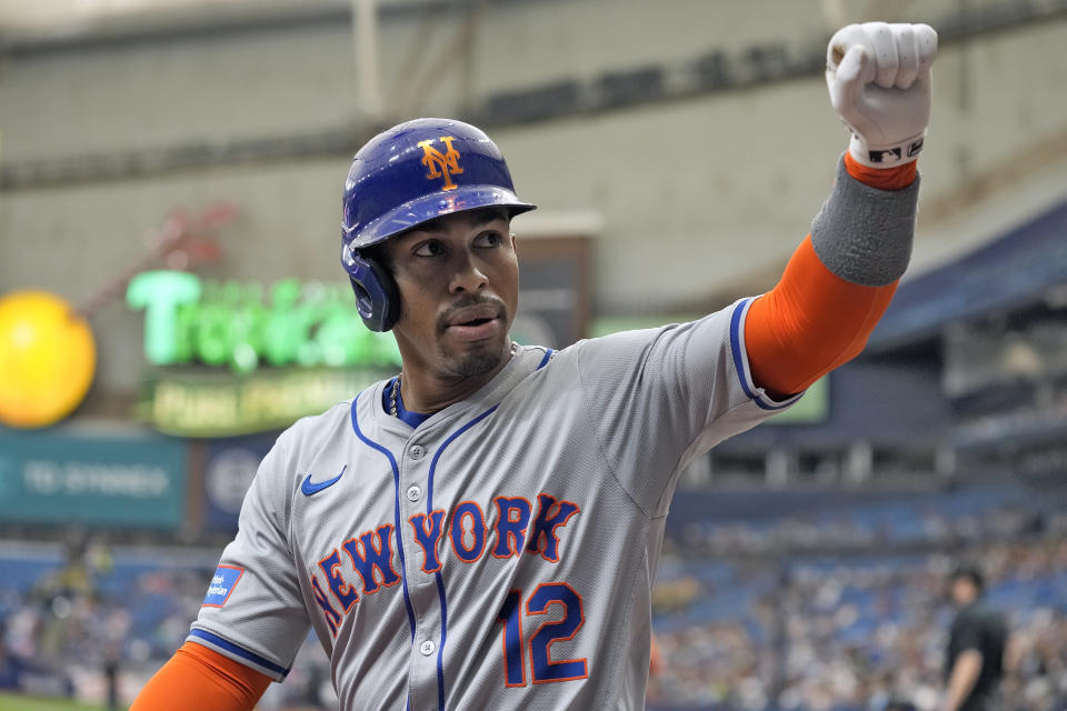 New York Mets' Francisco Lindor (12) celebrates his two-run home run off Tampa Bay Rays starting pitcher Ryan Pepiot during the first inning of a baseball game Sunday, May 5, 2024, in St. Petersburg, Fla. (AP Photo/Chris O'Meara)