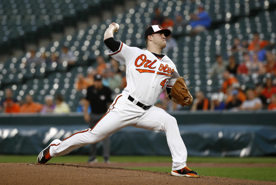 Baltimore Orioles starting pitcher David Hess throws to the Toronto Blue Jays in the first inning of a baseball game, Monday, Aug. 27, 2018, in Baltimore. (AP Photo/Patrick Semansky)