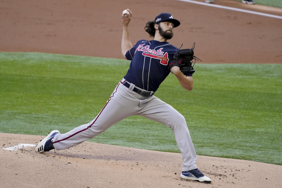 Atlanta Braves starting pitcher Ian Anderson throws against the Los Angeles Dodgers during the first inning in Game 2 of a baseball National League Championship Series Tuesday, Oct. 13, 2020, in Arlington, Texas. (AP Photo/Tony Gutierrez)