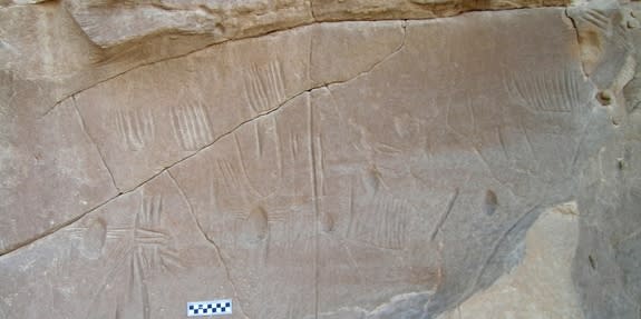 Archaeologists have discovered a broken panel that depicts the only known example of spider rock art in Egypt and, it appears, the entire Old World.