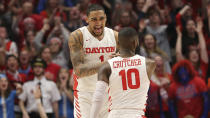 Dayton's Obi Toppin (1) and Jalen Crutcher (10) celebrate during the second half of an NCAA college basketball game against George Washington, Saturday, March 7, 2020, in Dayton, Ohio. (AP Photo/Tony Tribble)