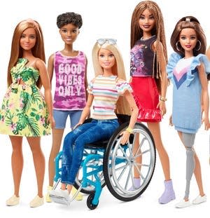 Barbie expanded its Fashionistas line to showcase dolls in a wheelchair and a removable prosthetic leg.