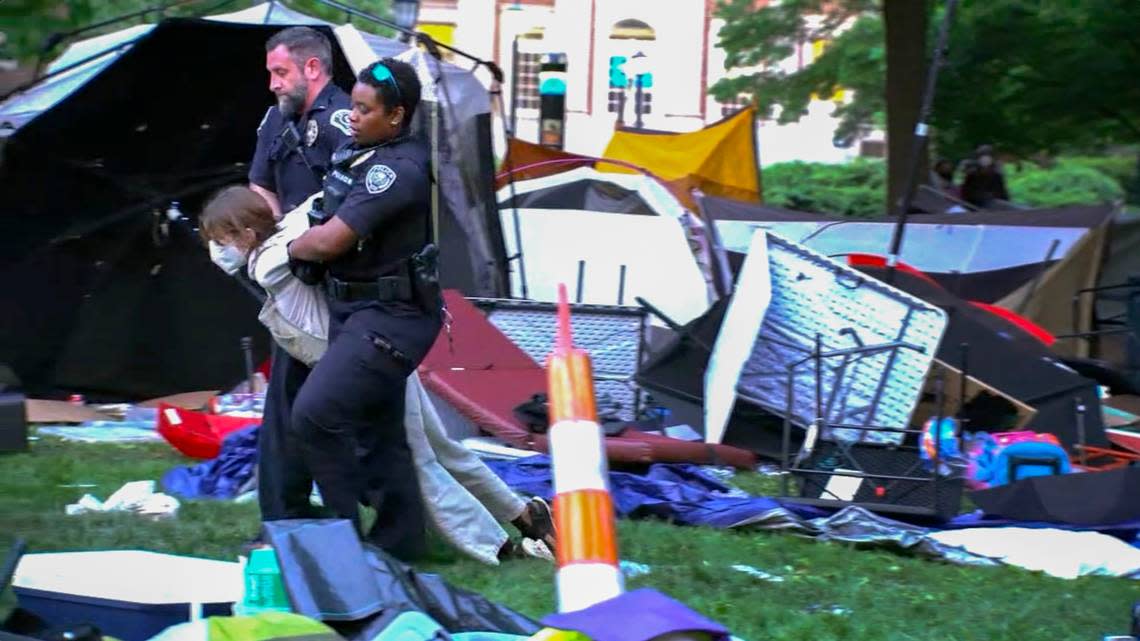Law enforcement officers move a Pro-Palestinian protester from the encampment on the UNC campus Tuesday morning, April 30, 2024. ABC11