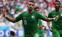<p>Saudi Arabia’s Salem al-Dawsari celebrates his late winner against Egypt </p>