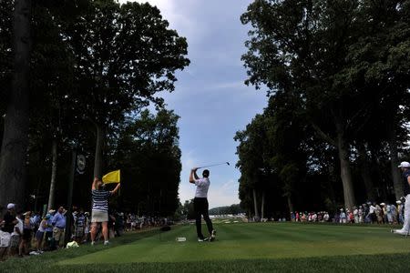 Jul 28, 2016; Springfield, NJ, USA; Jimmy Walker hits his tee shot on the fifth hole during the first round of the 2016 PGA Championship golf tournament at Baltusrol GC - Lower Course. Eric Sucar-USA TODAY Sports