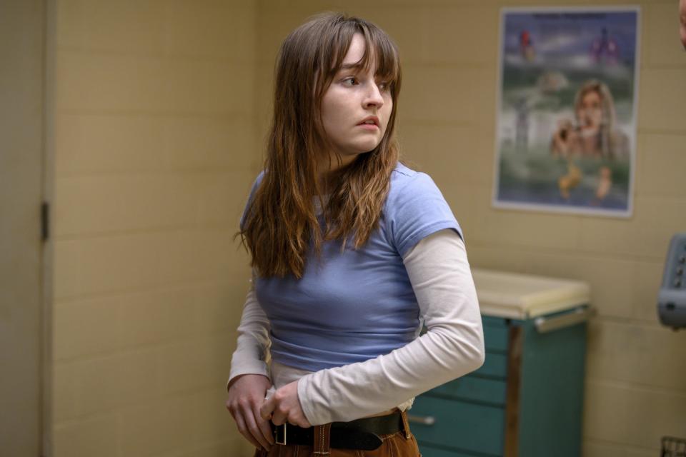 This image released by Hulu shows Kaitlyn Dever in a scene from "Dopesick," an eight-part miniseries about America’s opioid crisis, premiering Wednesday with three episodes. (Gene Page/Hulu via AP)