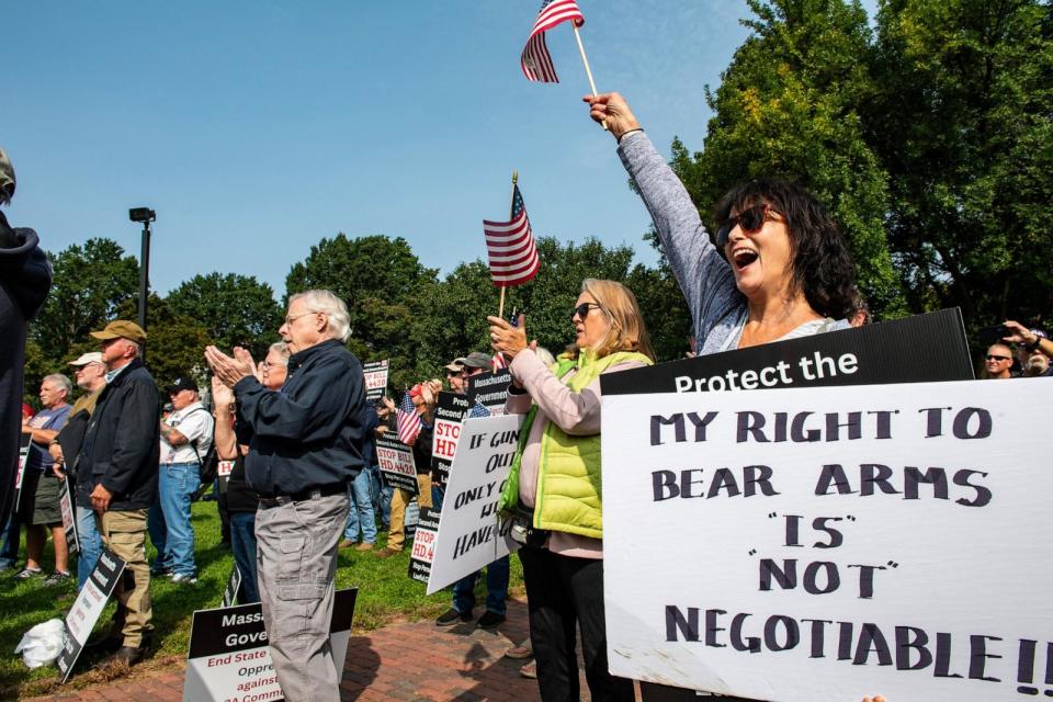 PHOTO: In this Sept. 27, 2023, file photo, demonstrators hold signs during a Gun Owners' Action League pro-gun rally in Boston. (Joseph Prezioso/AFP via Getty Images, FILE)