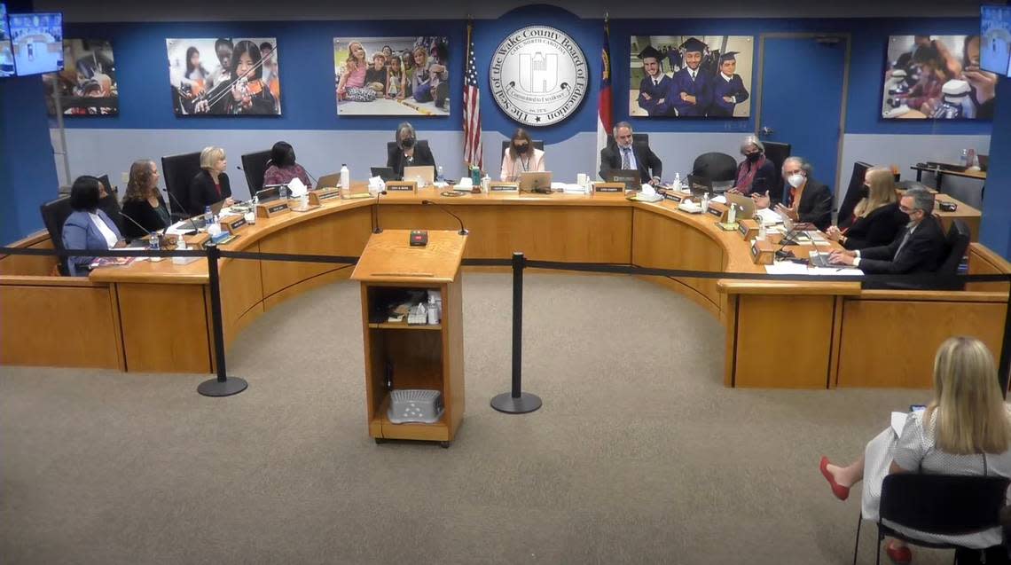 Members of the Wake County school board discuss an item on the agenda at the June 7, 2022 meeting. The Nov. 8 election will lead to at least five new school board members.