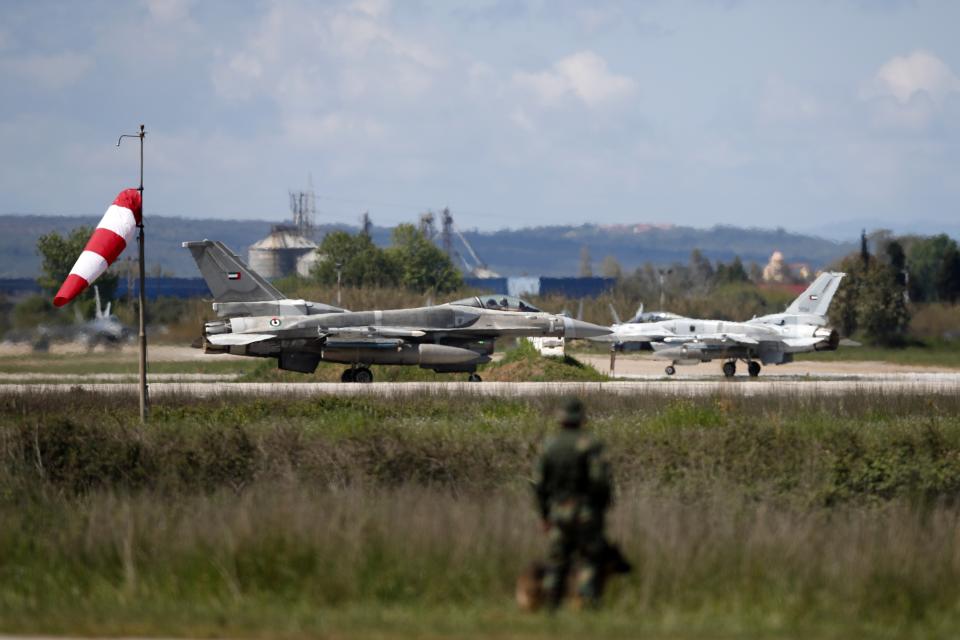 United Arab Emirates fighter jets F16 taxi during the international military exercise Iniochos at Andravida air base, about 279 kilometres (174 miles) southwest of Athens, Tuesday, April 20, 2021. Greece vowed Tuesday to expand military cooperation with traditional NATO allies as well as Middle Eastern powers in a race to modernize its armed forces and face its militarily assertive neighbor Turkey. (AP Photo/Thanassis Stavrakis)