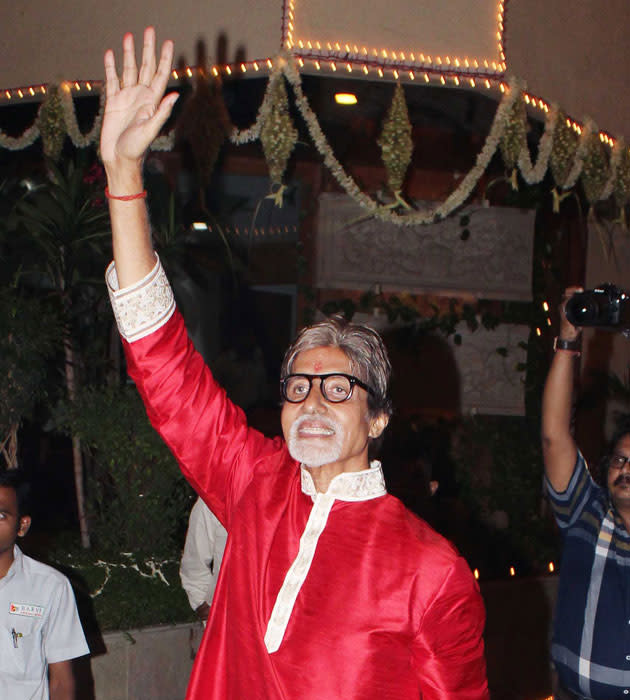 Amitabh Bachchan waves to his fans at his house Jalsa during Diwali celebrations