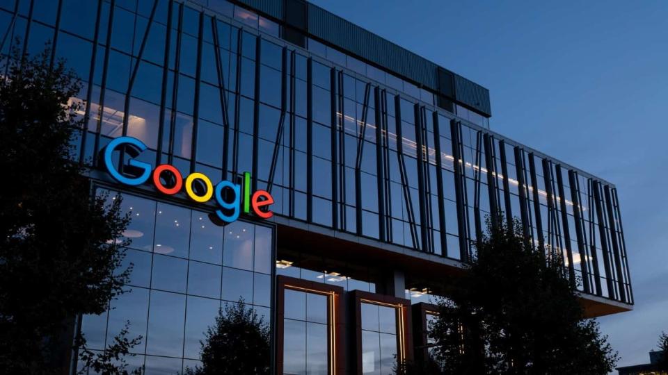 Exterior of Google's headquarters at dusk.