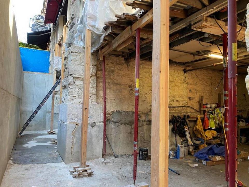 This photo, obtained by the Idaho Statesman via a public records request, shows red steel posts temporarily holding up the front of the Union Block building. “If you look closely, there are shoring posts that are bowing, and bowing means it’s overloaded,” Jason Blais, the city’s chief building official, said.