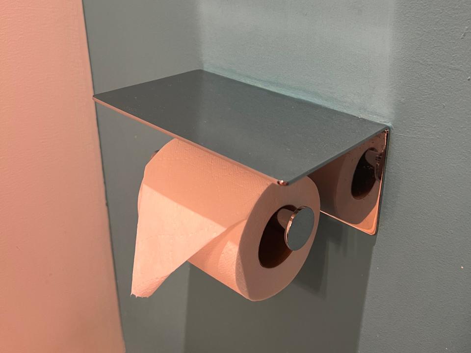 phone shelf toilet paper