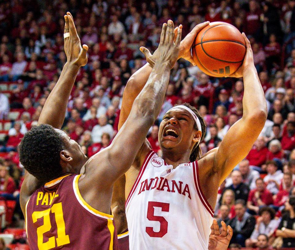 Indiana's Malik Reneau (5) shoots over Minnesota's Pharrel Payne (21) during the Indiana versus Minnesota men's basketball game at Simon Skjodt Assembly Hall on Friday, Jan. 12, 2024.