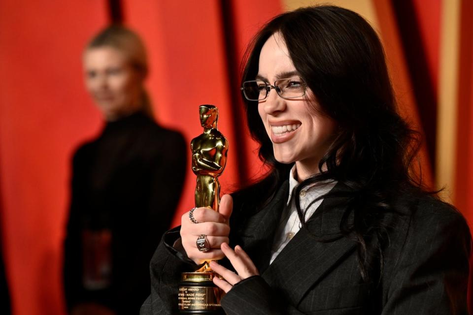 Billie Eilish with her second Oscar at the 2024 Academy Awards in Los Angeles (AP)