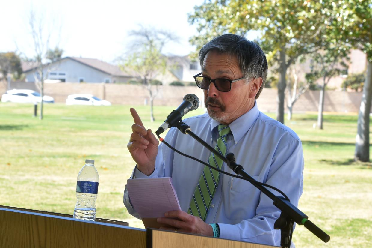 Oxnard College President Luis Sanchez speaks during a flag-raising event on Thursday, March 17, 2022 to show support for the Ukrainian people.
