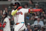 Atlanta Braves designated hitter Marcell Ozuna drives in the go ahead run with a base hit in the eighth inning of a baseball game against the Boston Red Sox Tuesday, May 7, 2024, in Atlanta. (AP Photo/John Bazemore)
