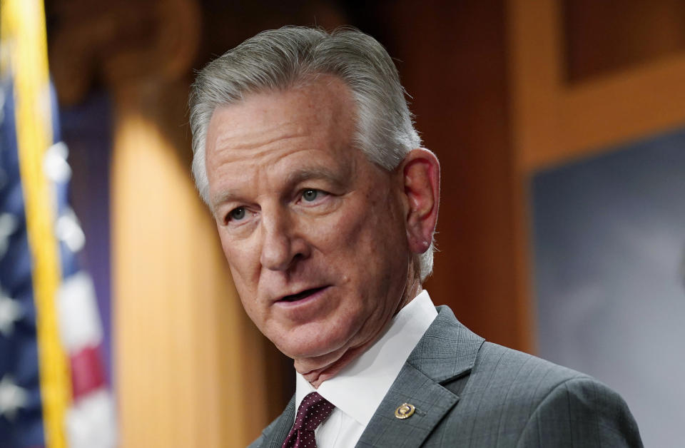 FILE - Sen. Tommy Tuberville, R-Ala., listens to question during a news conference March 30, 2022, in Washington. Tuberville told people at an election rally Saturday, Oct. 8, in Nevada that Democrats support reparations for the descendants of enslaved people because “they think the people that do the crime are owed that.” His remarks — seen by many as racist and stereotyping Black Americans as people committing crimes — cut deeply for some, especially in and around Africatown, a community in Mobile, Ala., that was founded by descendants of Africans who were illegally smuggled into the United States in 1860 aboard a schooner called the Clotilda. (AP Photo/Mariam Zuhaib, File)