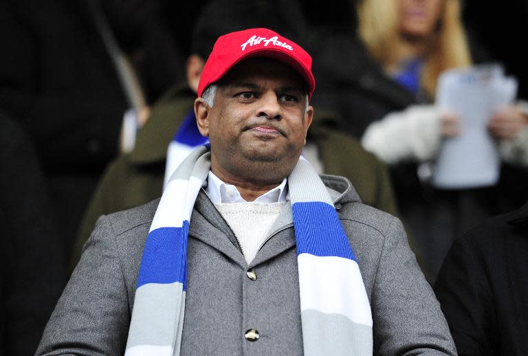 Tony Fernandes watches an English Premier League match between his club Queens Park Rangers and Fulham at Loftus Road in London on December 15, 2012