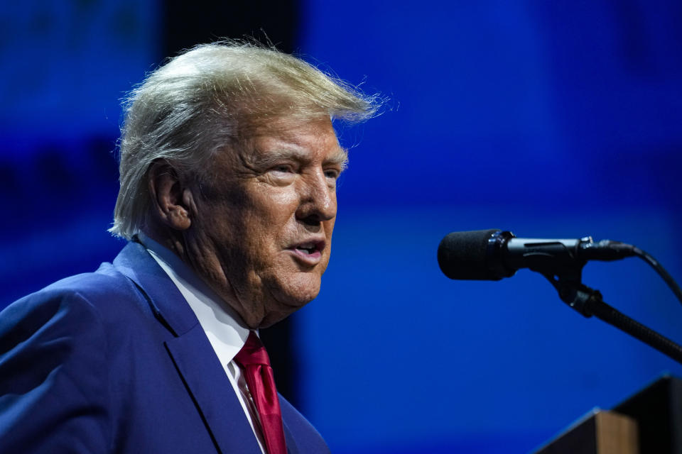 FILE - Former President Donald Trump speaks at the National Rifle Association Convention in Indianapolis, Friday, April 14, 2023. ury selection starts Tuesday in E. Jean Carroll's rape lawsuit in a New York federal court. The former Elle magazine advice columnist alleges that Trump raped her in a luxury department store dressing room in the mid-1990s. (AP Photo/Michael Conroy, File)