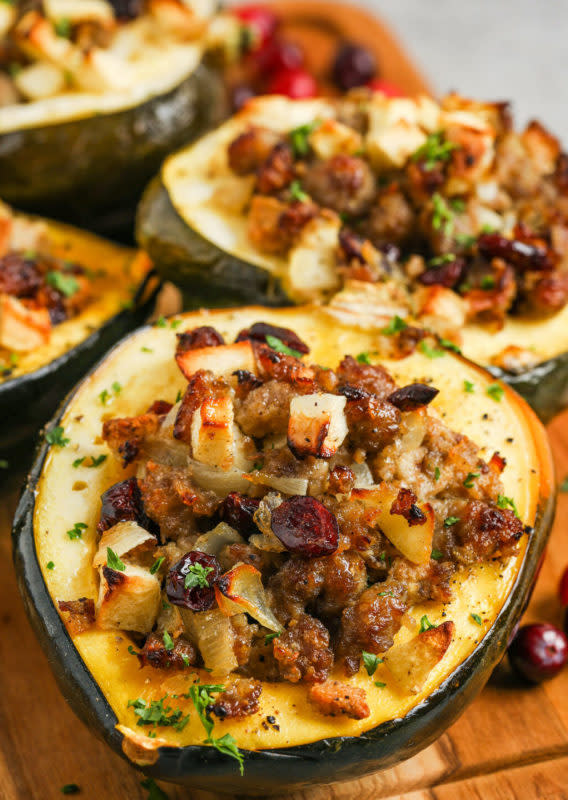 <p>Spend With Pennies</p><p>Sweet and tender squash filled with a savory cranberry sausage stuffing and baked until golden. This will a hit with the family. </p><p>.<strong>Get the recipe: <a href="https://www.spendwithpennies.com/stuffed-acorn-squash/" rel="nofollow noopener" target="_blank" data-ylk="slk:Stuffed Acorn Squash with Sausage and Cranberries;elm:context_link;itc:0;sec:content-canvas" class="link ">Stuffed Acorn Squash with Sausage and Cranberries</a></strong></p>