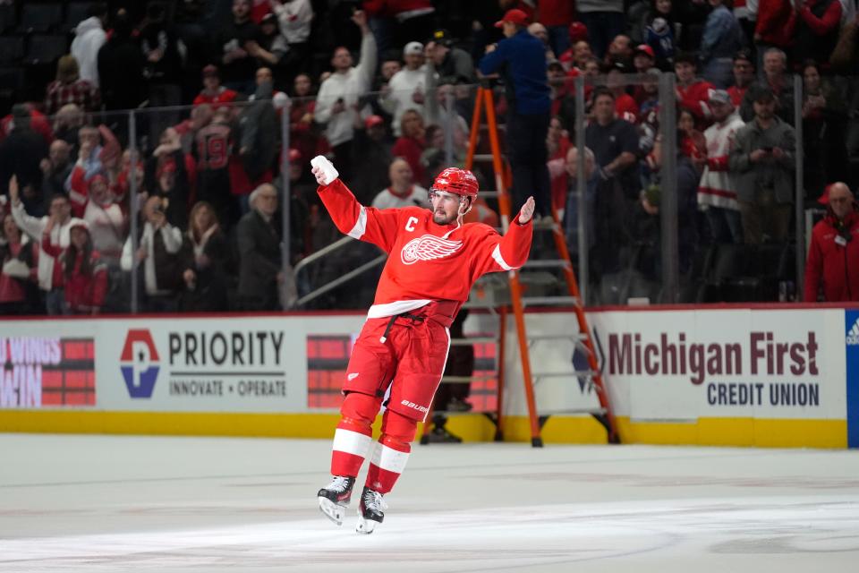 Detroit Red Wings center Dylan Larkin (71) celebrates after beating the Colorado Avalanche, 2-1, in OT, at Little Caesars Arena in Detroit on Thursday, Feb. 22, 2024.