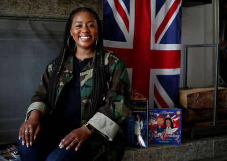 Ishea Brown, who plans to hold a Royal wedding viewing party with 19 of her friends, complete with fascinators and Hennessy, poses for a portrait at her apartment in Seattle, Washington, U.S., May 14, 2018. Picture taken May 14, 2018. REUTERS/Lindsey Wasson