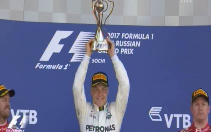 Valtteri Bottas lifts his first winner's trophy  - Credit: Sky Sports F1