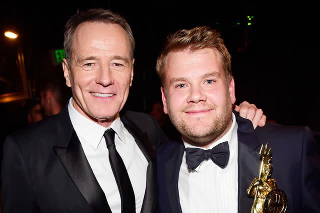 <p>Frazer Harrison/BAFTA LA/Getty</p> Bryan Cranston (left) and James Corden