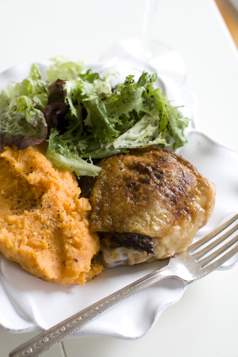 This Nov. 11, 2013 photo shows spinach stuffed chicken thighs in Concord, N.H. (AP Photo/Matthew Mead)