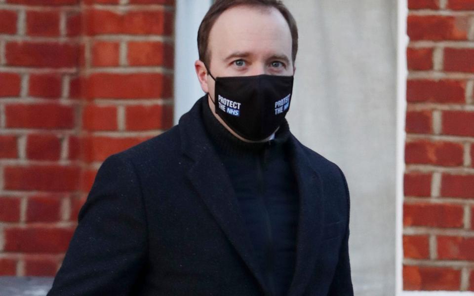 Matt Hancock leaving his home for his first day back at work after his isolation - Beretta Sims/Shutterstock