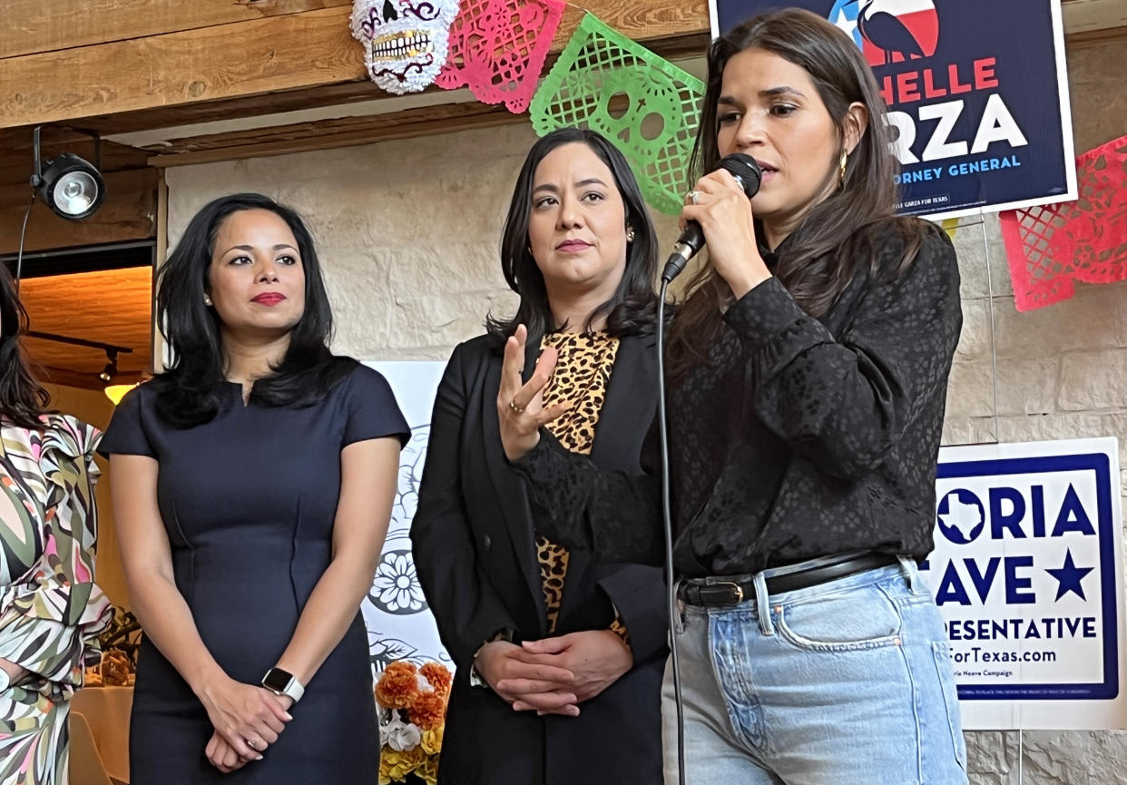Eochelle Garza, center, looks on as actress and activist America Ferrera speaks at an event in Dallas. (Suzanne Gamboa / NBC News)